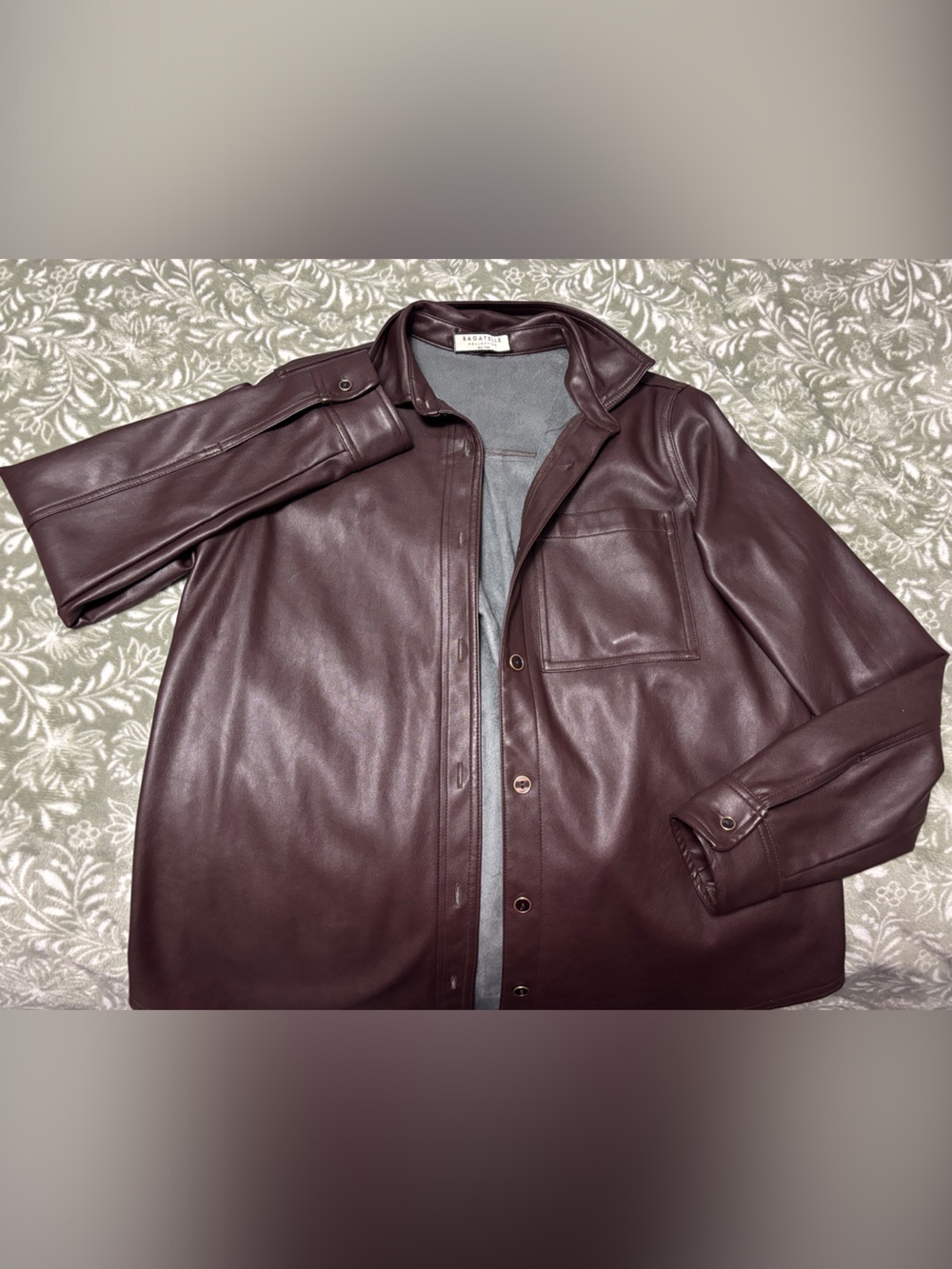 bagatelle Men's Leather Shirt Jacket, in Burgundy, comes with extra buttons.